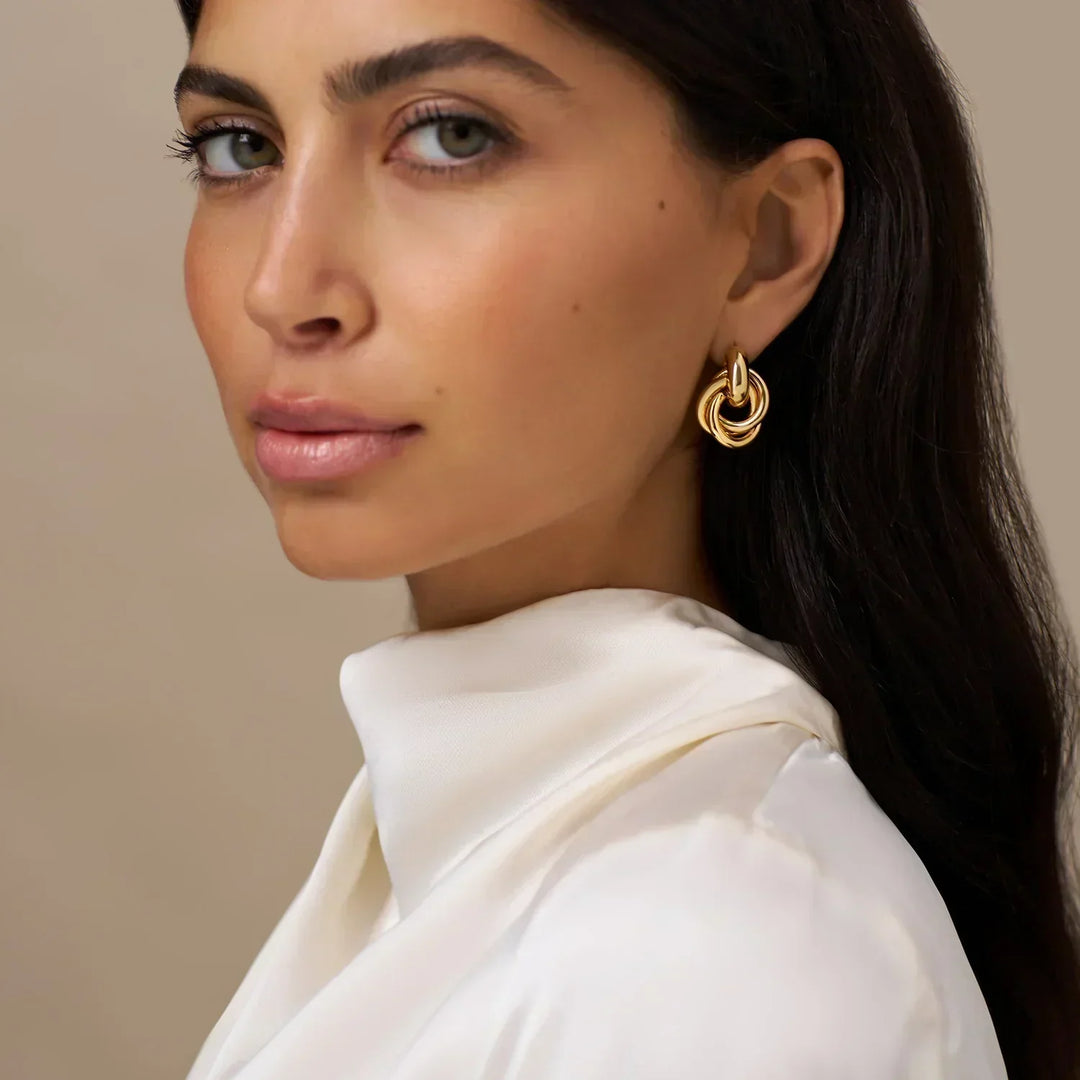 Boucles d'oreilles entrelacées Utsagda