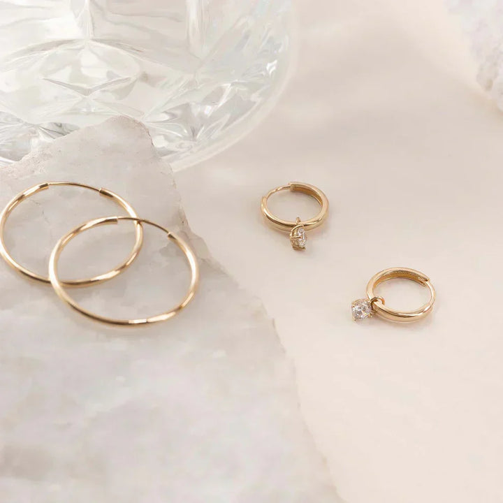 Boucles d'oreilles créoles en pierre de lune