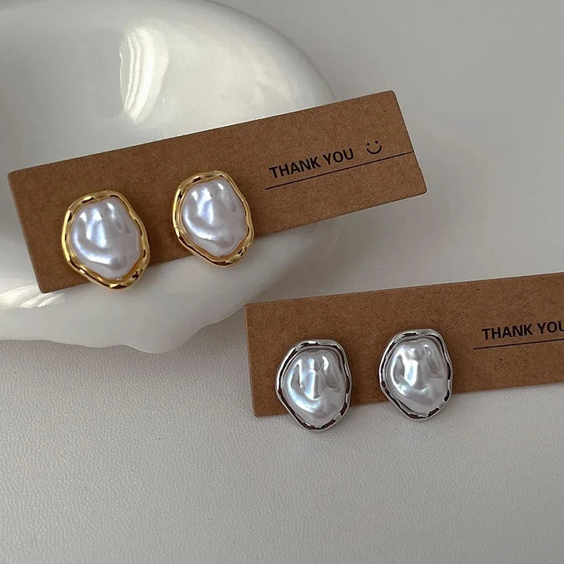 Élégantes boucles d'oreilles en perles de Carmen