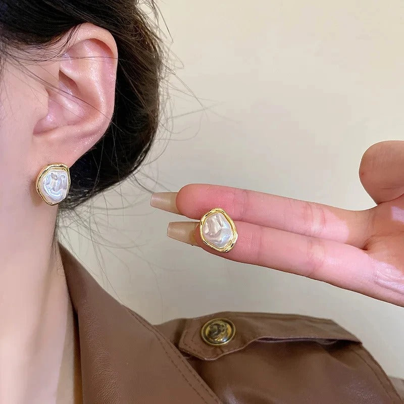 Élégantes boucles d'oreilles en perles de Carmen