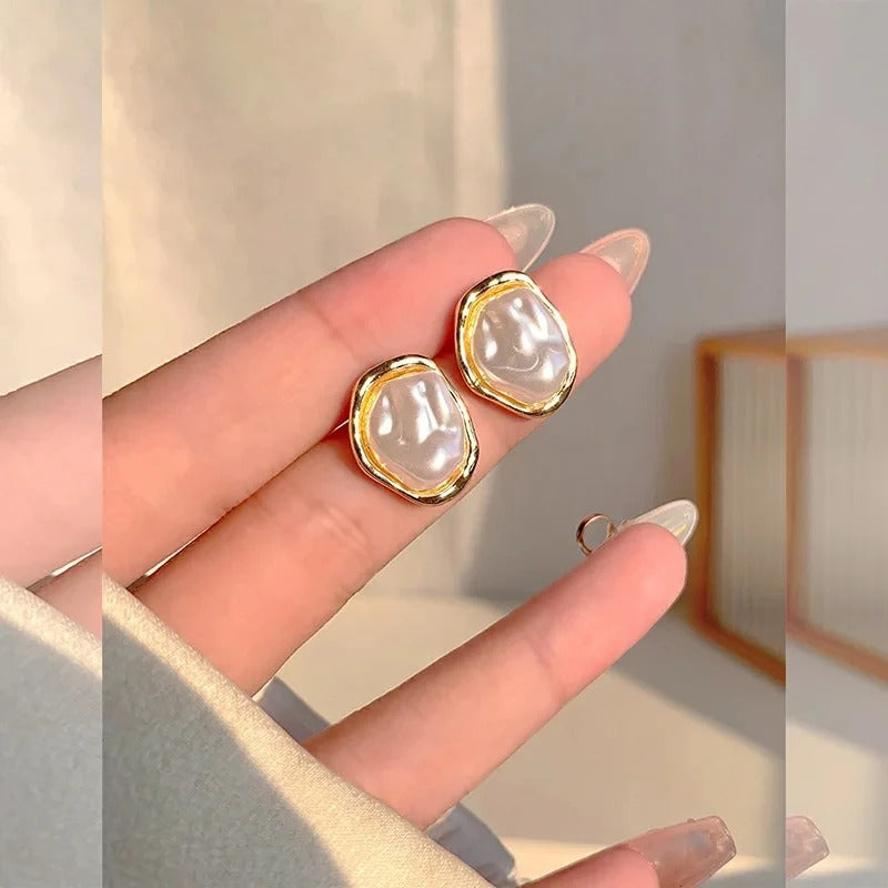 Élégantes boucles d'oreilles en perles de Carmen
