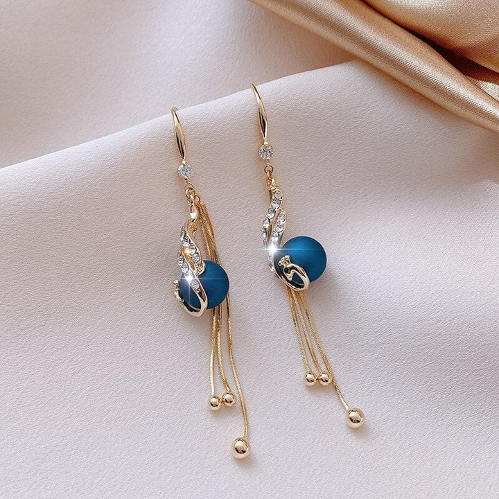 Boucles d'oreilles avec perles bleues pour les fêtes