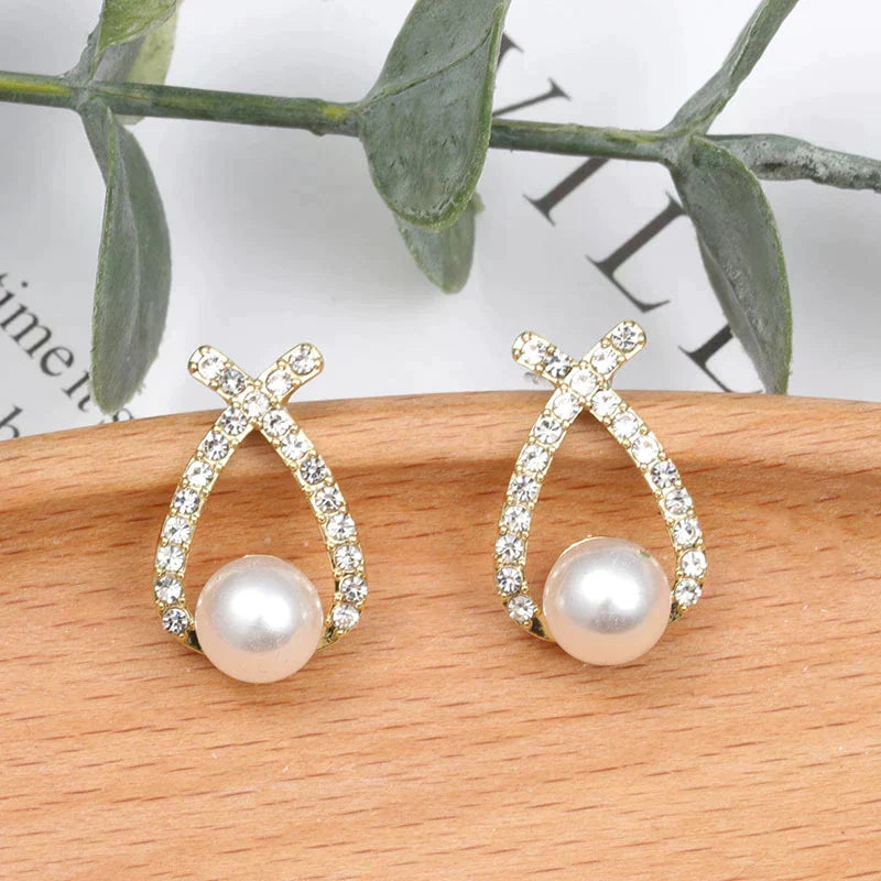 Boucles d'oreilles ornées de perles et de paillettes